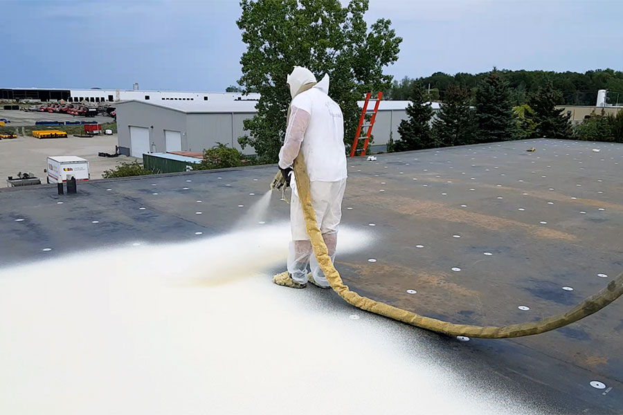 Professional spray foam roofing installation commercial building