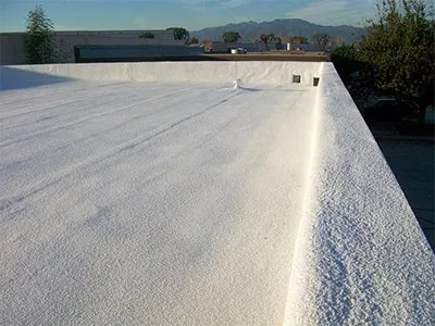 Finished spray polyurethane foam roof white reflective coating