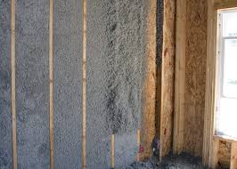 Dense pack cellulose insulation installed in wall cavity