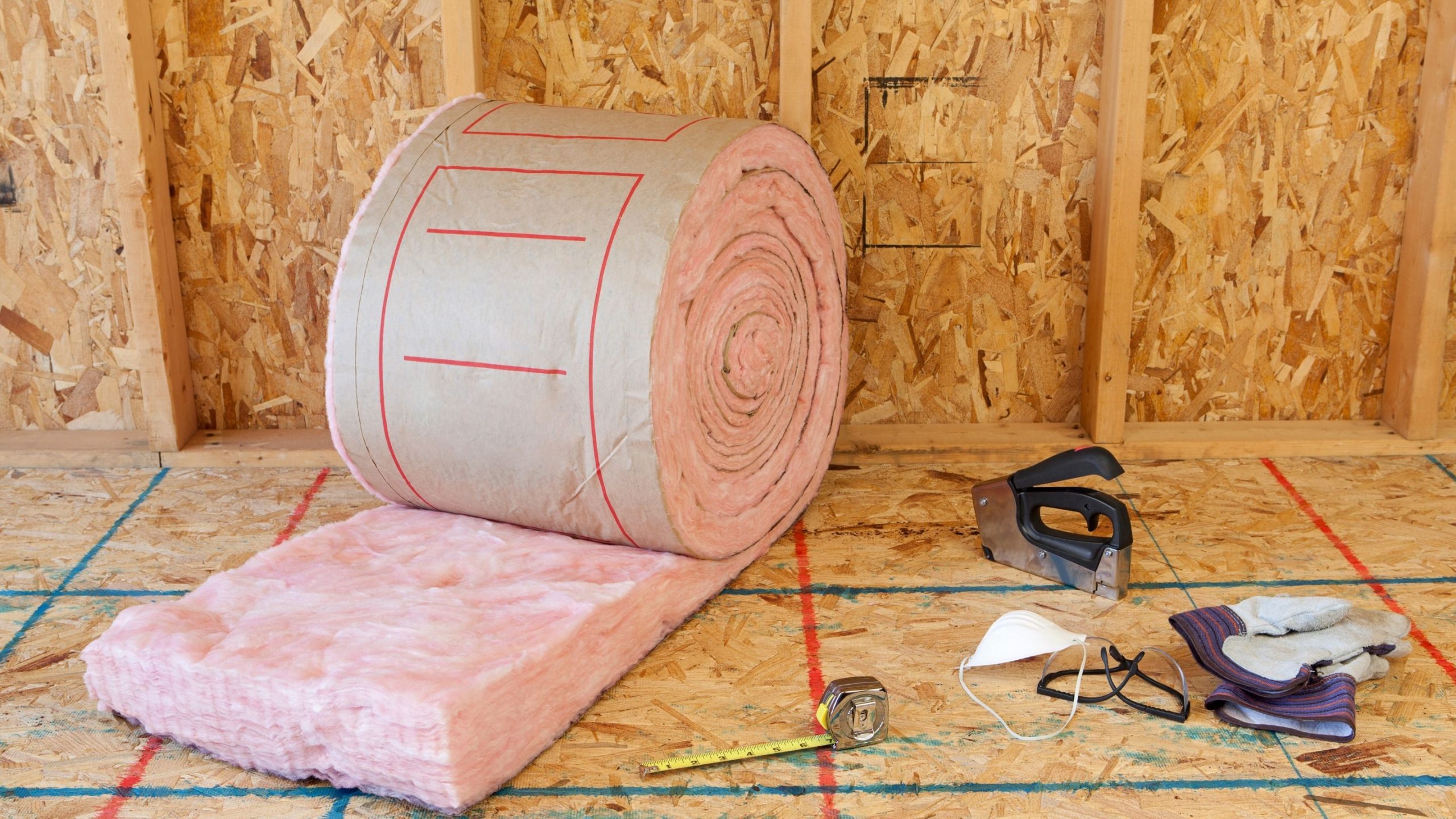 Pink fiberglass insulation roll ready for installation