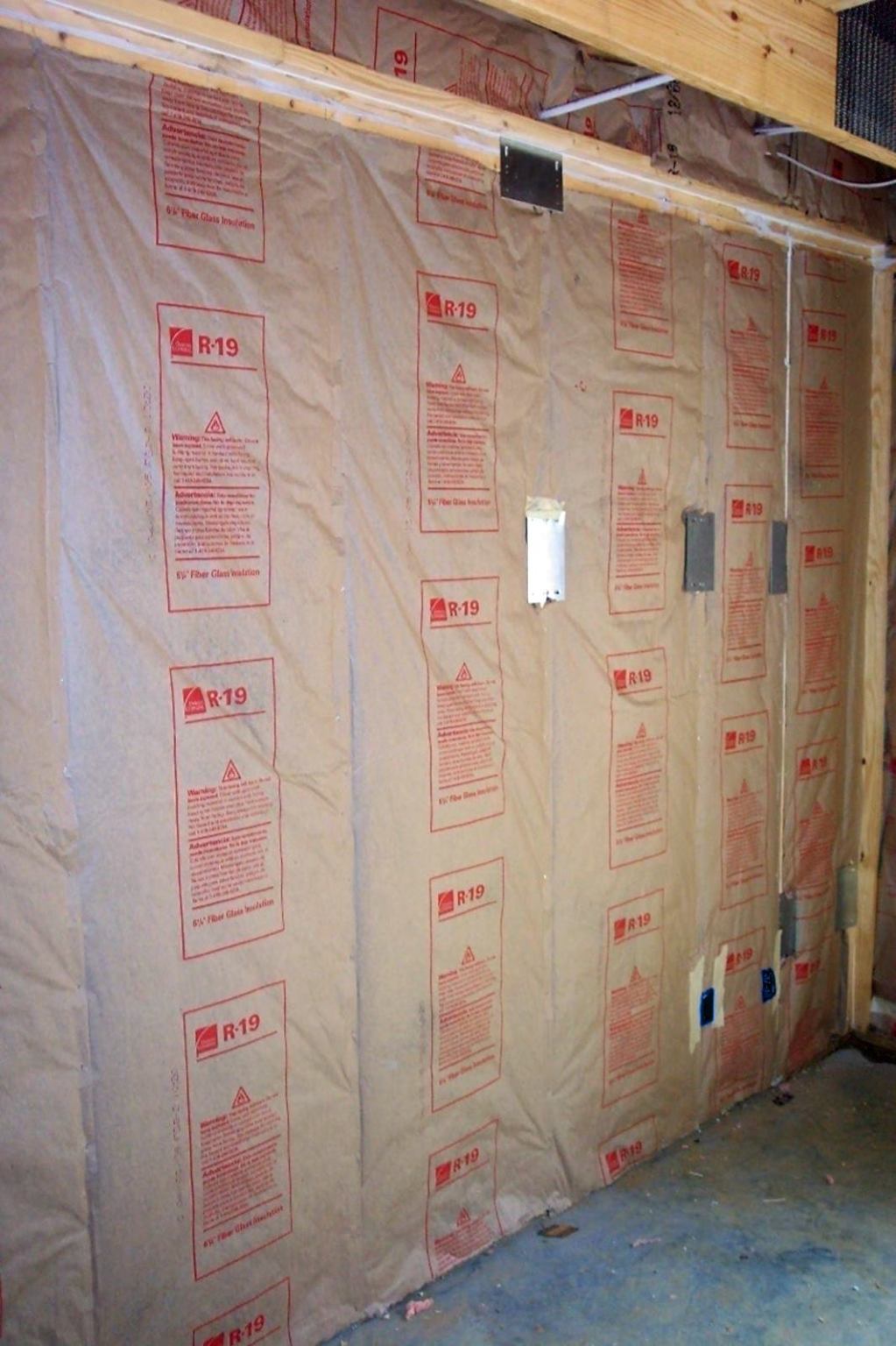 R-19 fiberglass batt insulation installed in wall studs